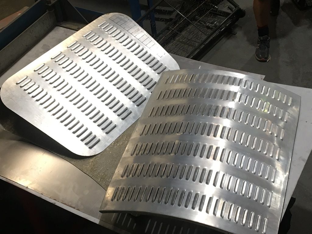 Louvers scream HOTROD! They can also take excess heat out of the engine bay.