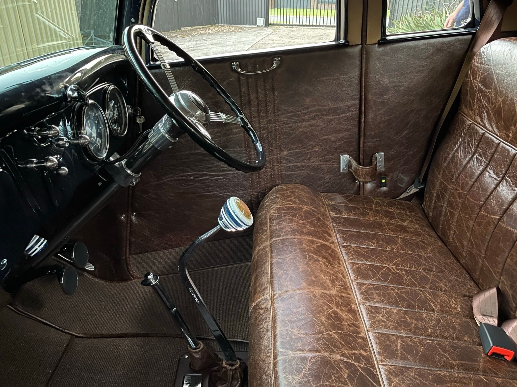 Distressed leather in Aston Oak, shifter knob by Deluxe Creations in WA