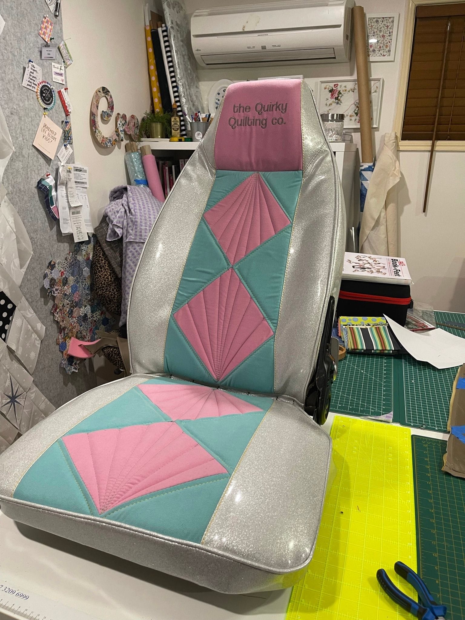 the Quirky Quilting Co required a branded seat for their custom Suzuki Carry. This seat incorporates quilting techniques and their corporate colours.